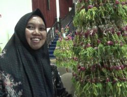 Helminawati, Dua Dekade Menekuni Payung Kembang hingga Raih Juara Pertama Helminawati, Dua Dekade Menekuni Payung Kembang hingga Raih Juara Pertama